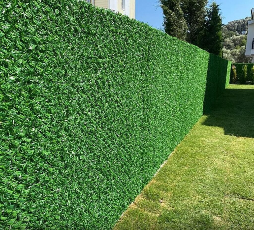 Outdoor application of artificial grass tiles and wall panels