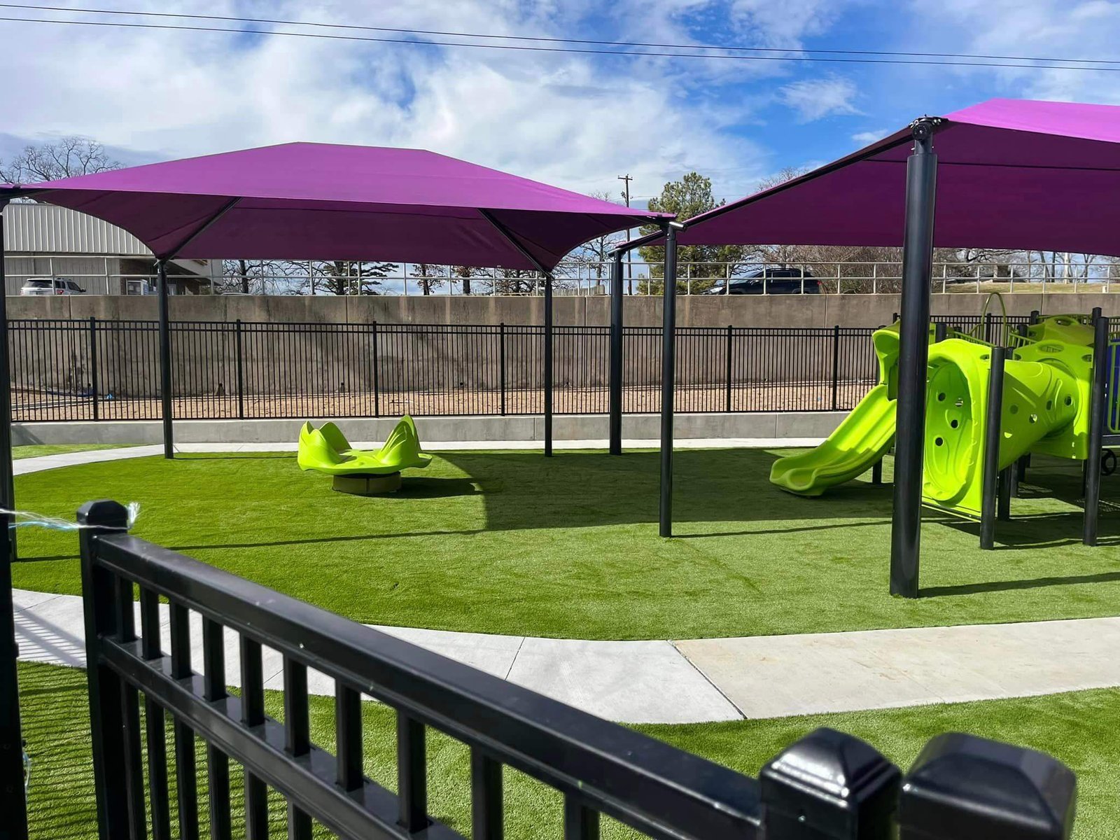 Playground equipment on artificial grass in Lubbock, TX